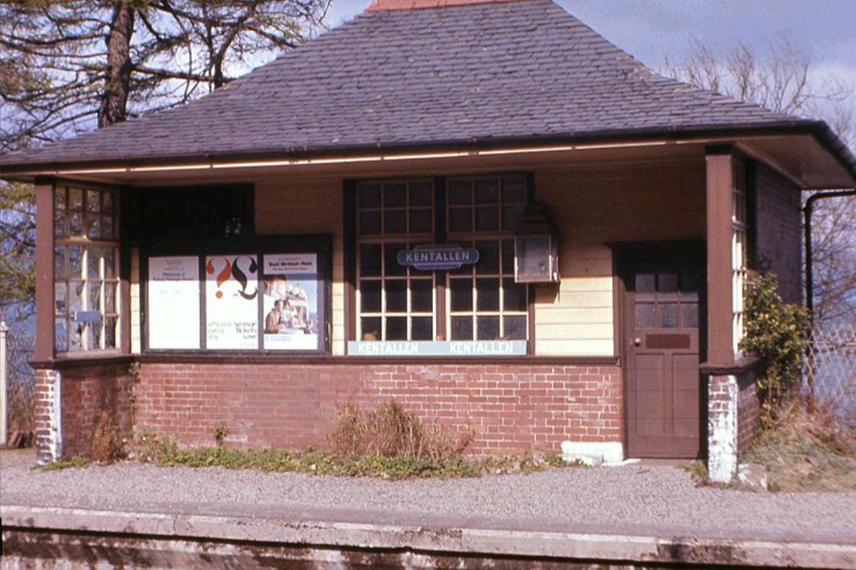 Close up colour photograph of the Kentallen Station building with its timber and brick frontage