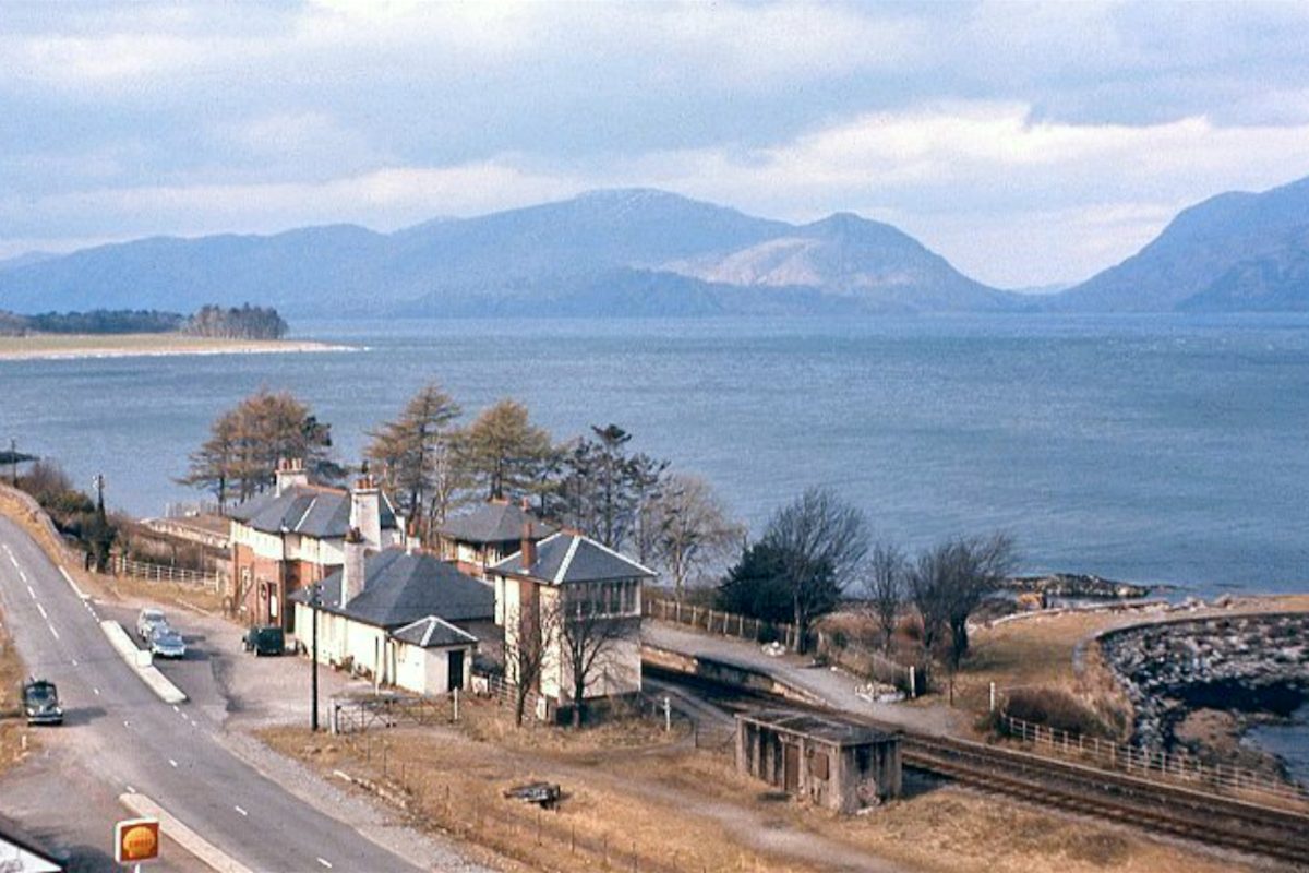 Kentallen Station and the loch beyond, photographed in colour from the hillside